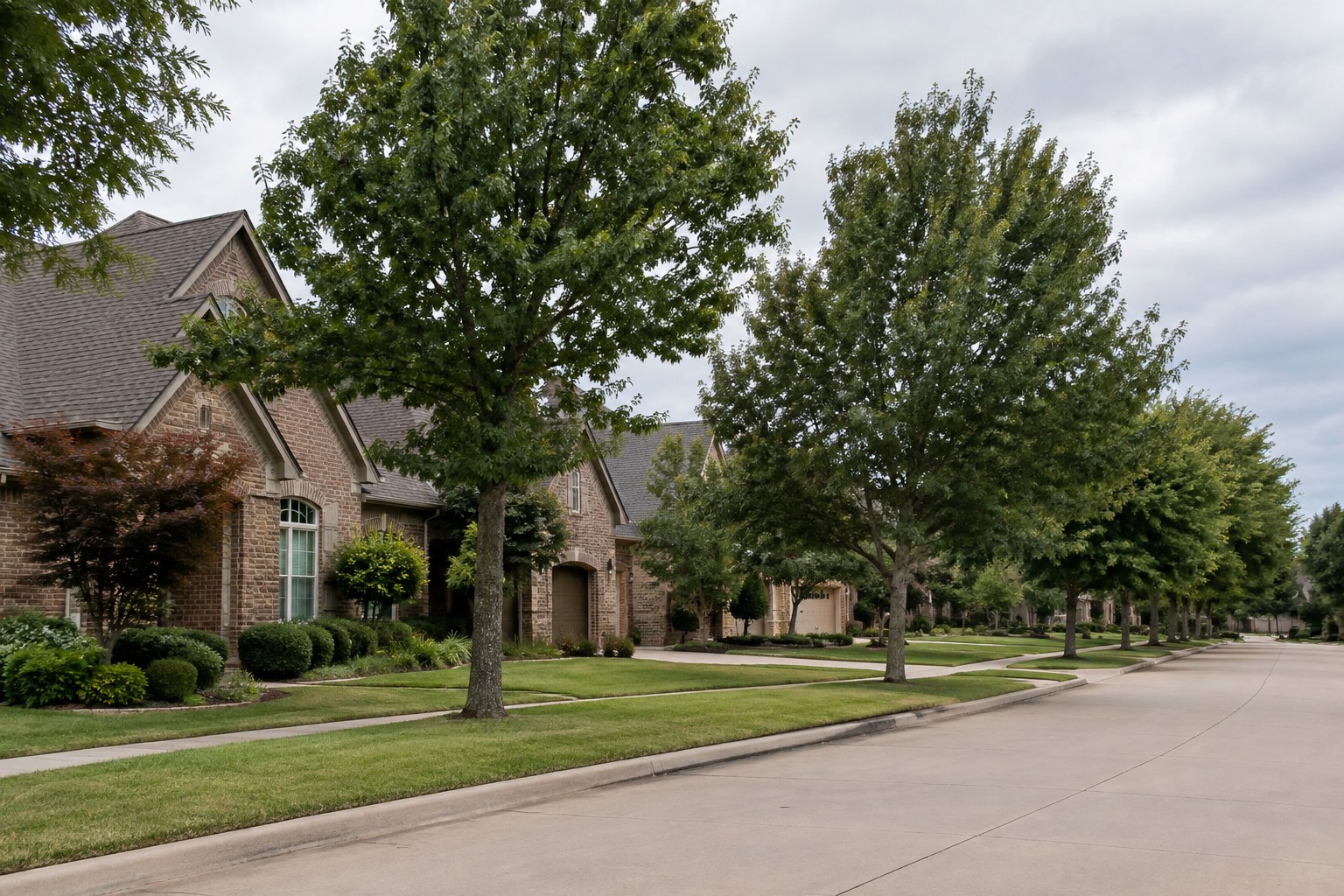 A quiet Edmond, Oklahoma residential street, illustrative